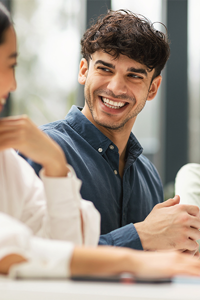 man laughing with woman