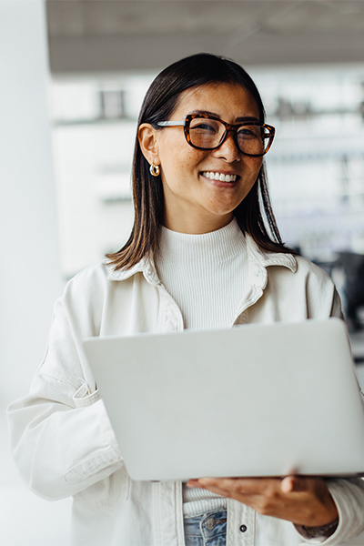 woman smiling with laptop